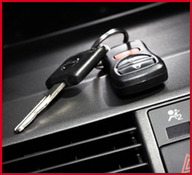 car key on dashboard